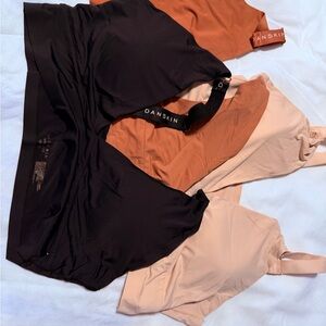 Danskin set of 3 Black, Orange, and Beige Sports Bras
